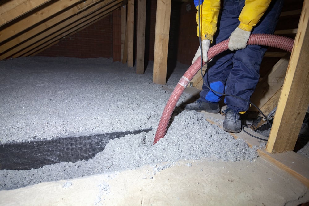 Spraying,Cellulose,Insulation,In,The,Attic,Of,A,House.,Insulation